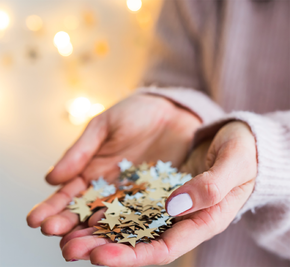 Hand full of paper stars